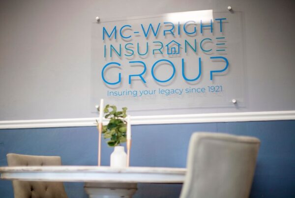 The Power of Choice: Why choosing an Independent Agent Matters - McWright Insurance Group Office Meeting Table and Agency Sign